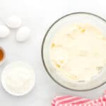 whipped cream cheese in a glass bowl.
