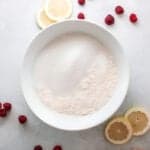 flour and sugar in a white bowl.
