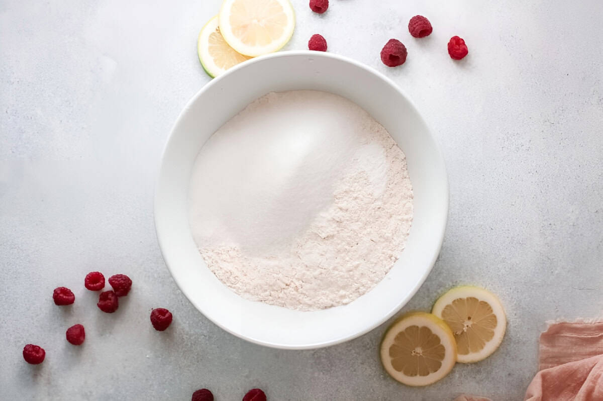 flour and sugar in a white bowl.