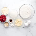 portioned ingredients for raspberry blondies in individual containers.