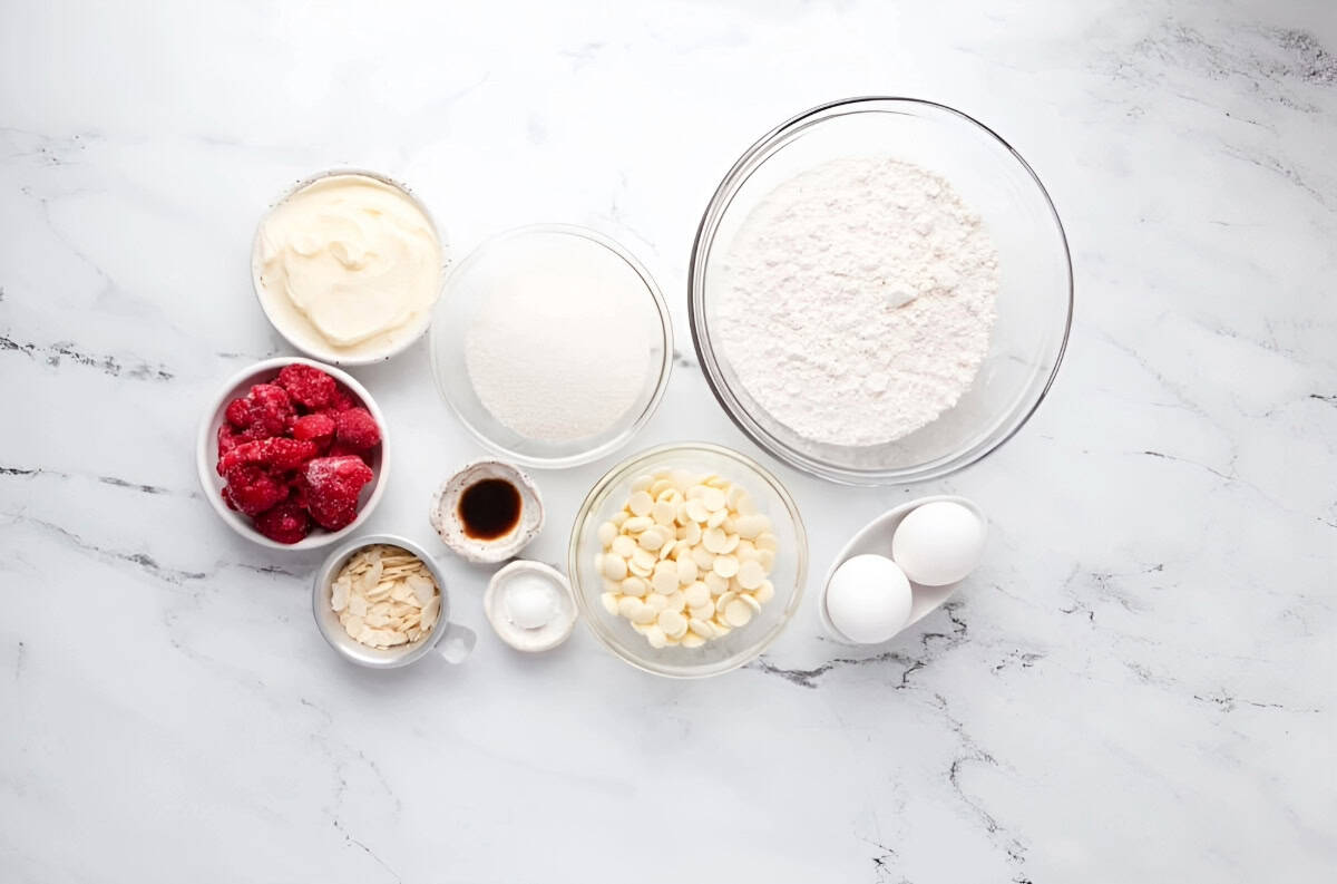 portioned ingredients for raspberry blondies in individual containers.