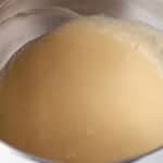 creamed butter, sugar, eggs, and vanilla in a stand mixer bowl.