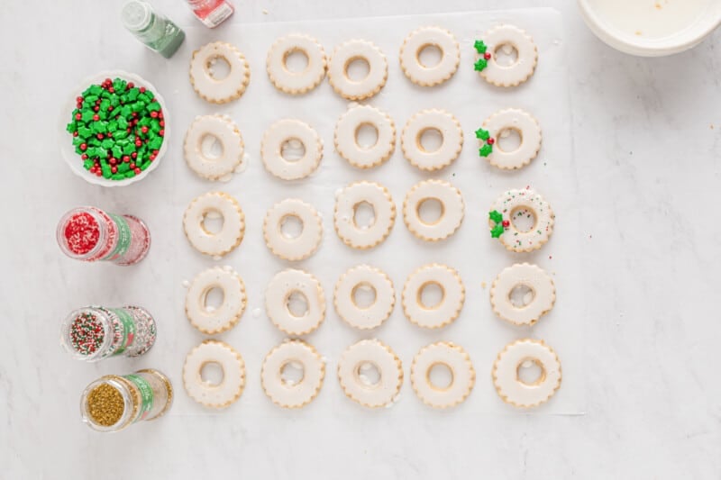 shortbread cookies lined up next to cookie decorations