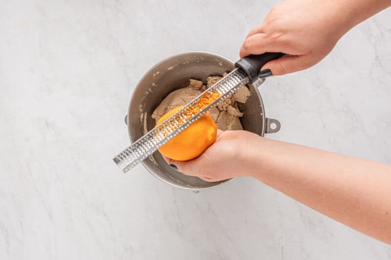 zesting citrus into the cookie dough