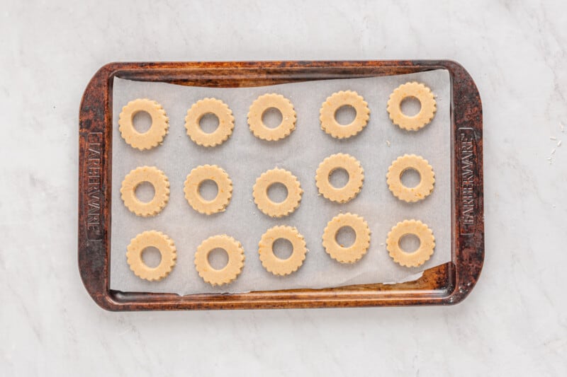 shortbread cookies lined up on a baking sheet