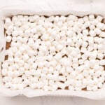 a tray of food with marshmallows.