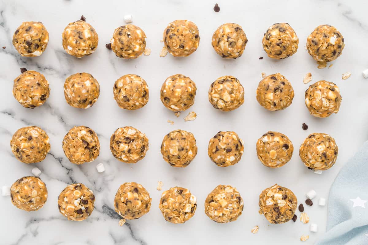 27 s'mores energy balls on wax paper.