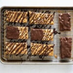 chocolate peanut butter granola bars on a cooling rack.