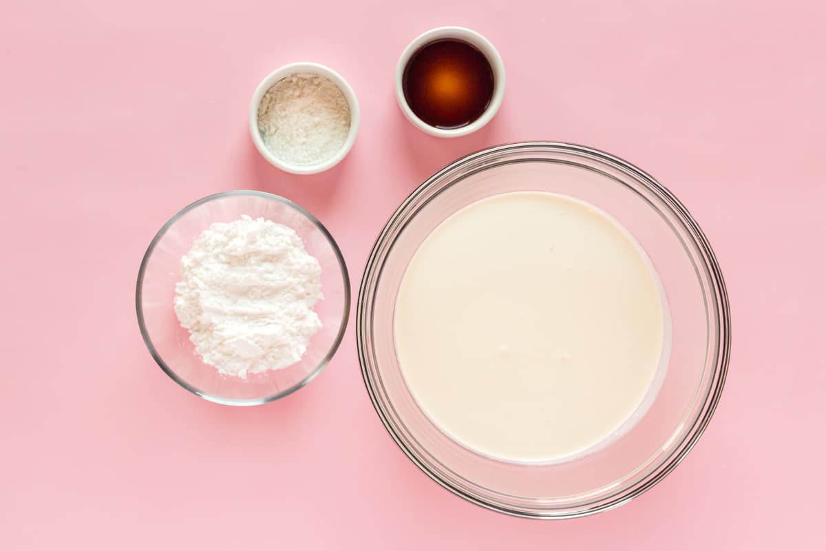 a bowl of flour and a bowl of powder.