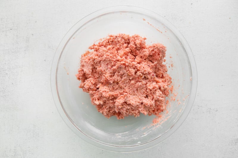 strawberry cake truffle mixture in a glass bowl.