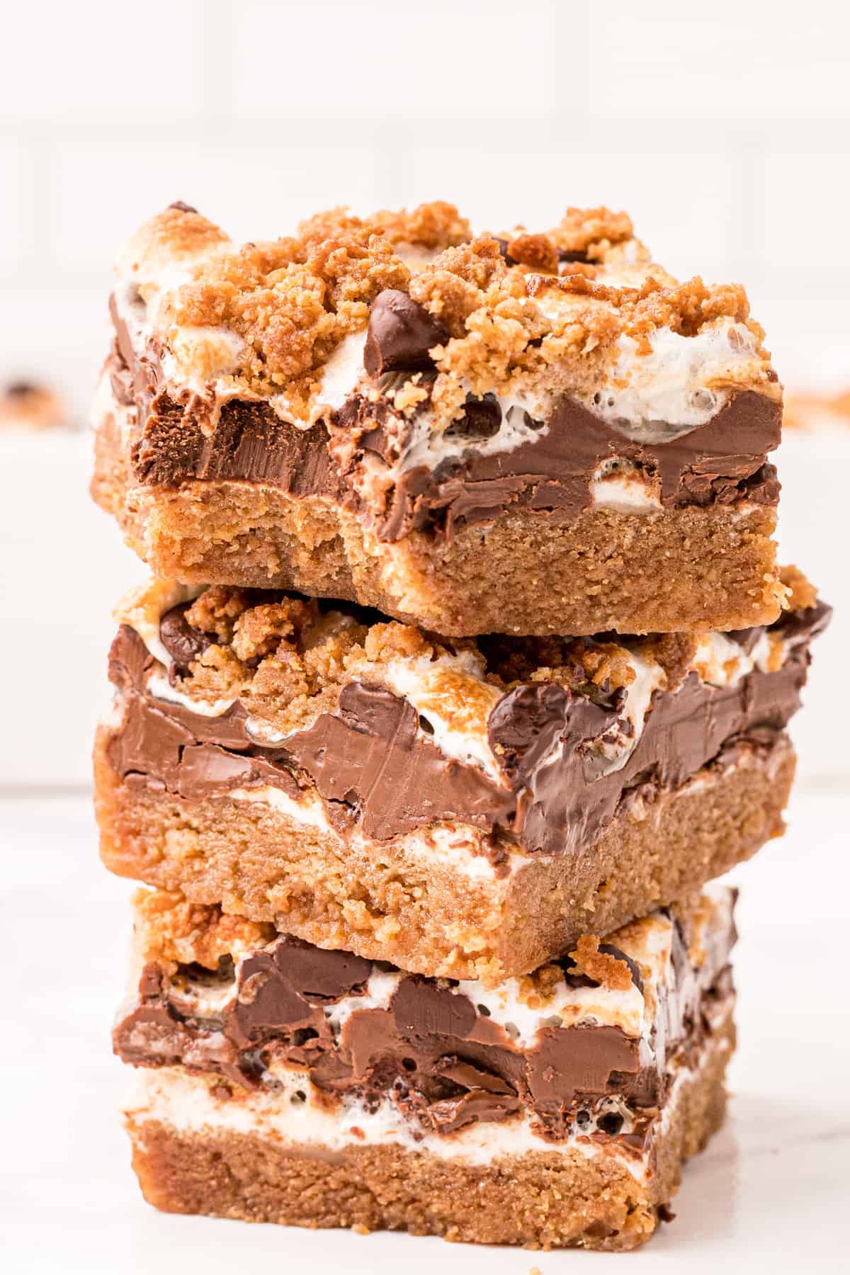 three s'mores bars stacked on top of each other