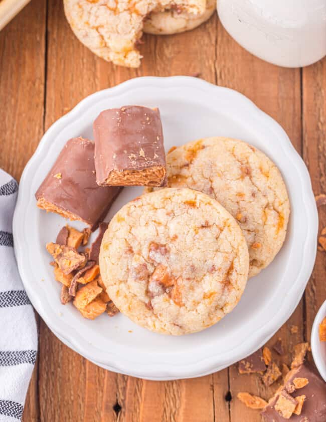 a plate with cookies and a glass of milk.