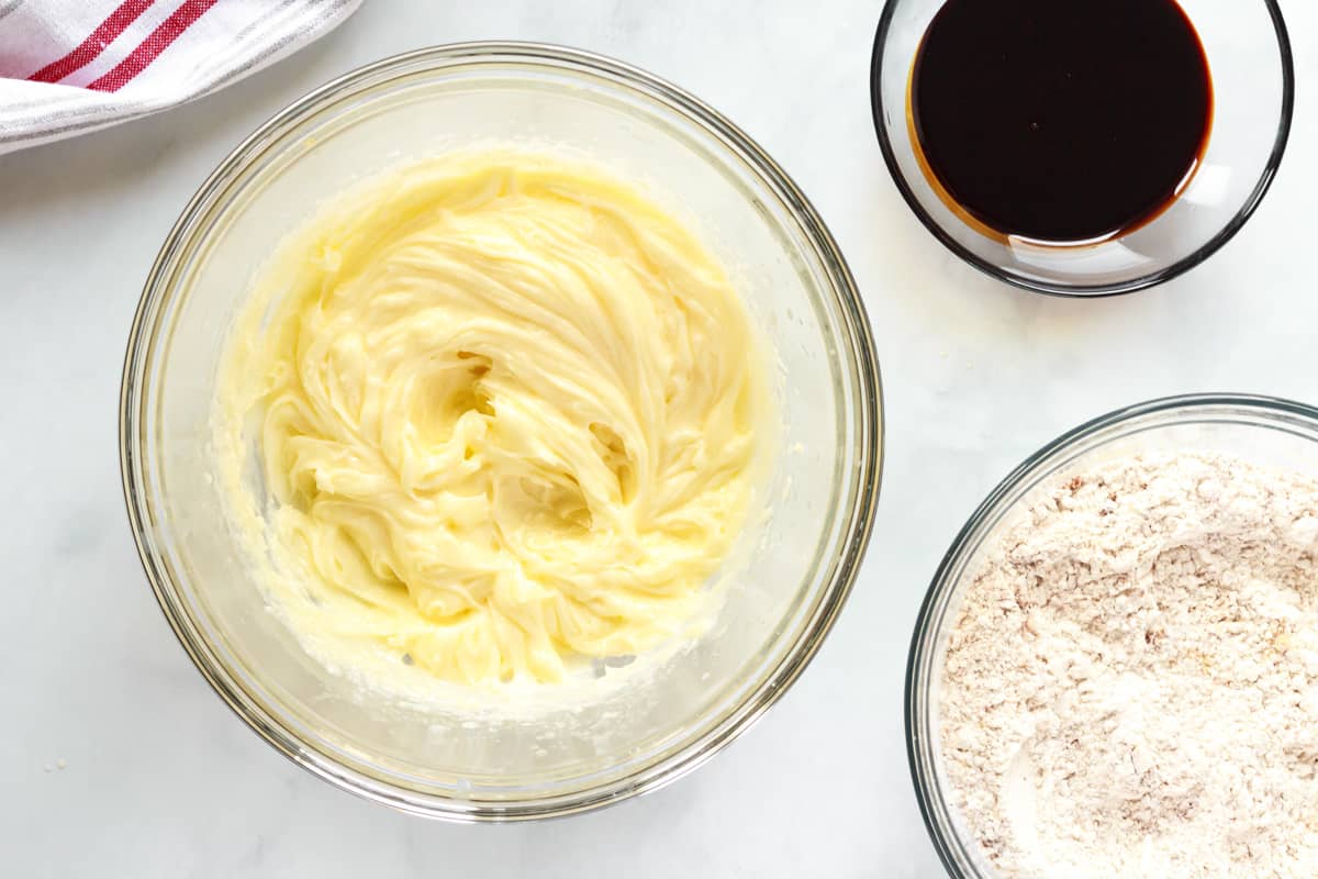 wet ingredients for gingersnap cookies in a glass bowl.