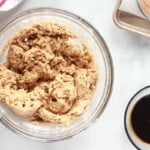 wet and dry ingredients for gingersnap cookies in a glass bowl.