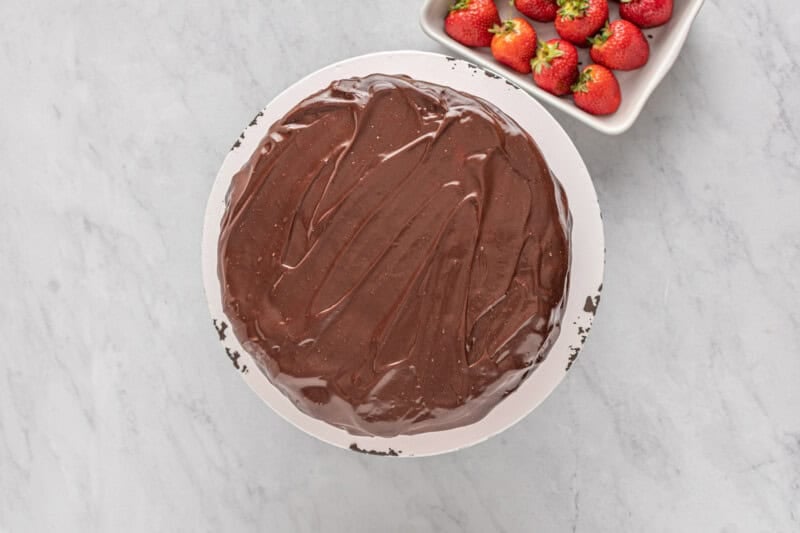 a chocolate cake and strawberries.