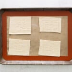a tray with dough on it.