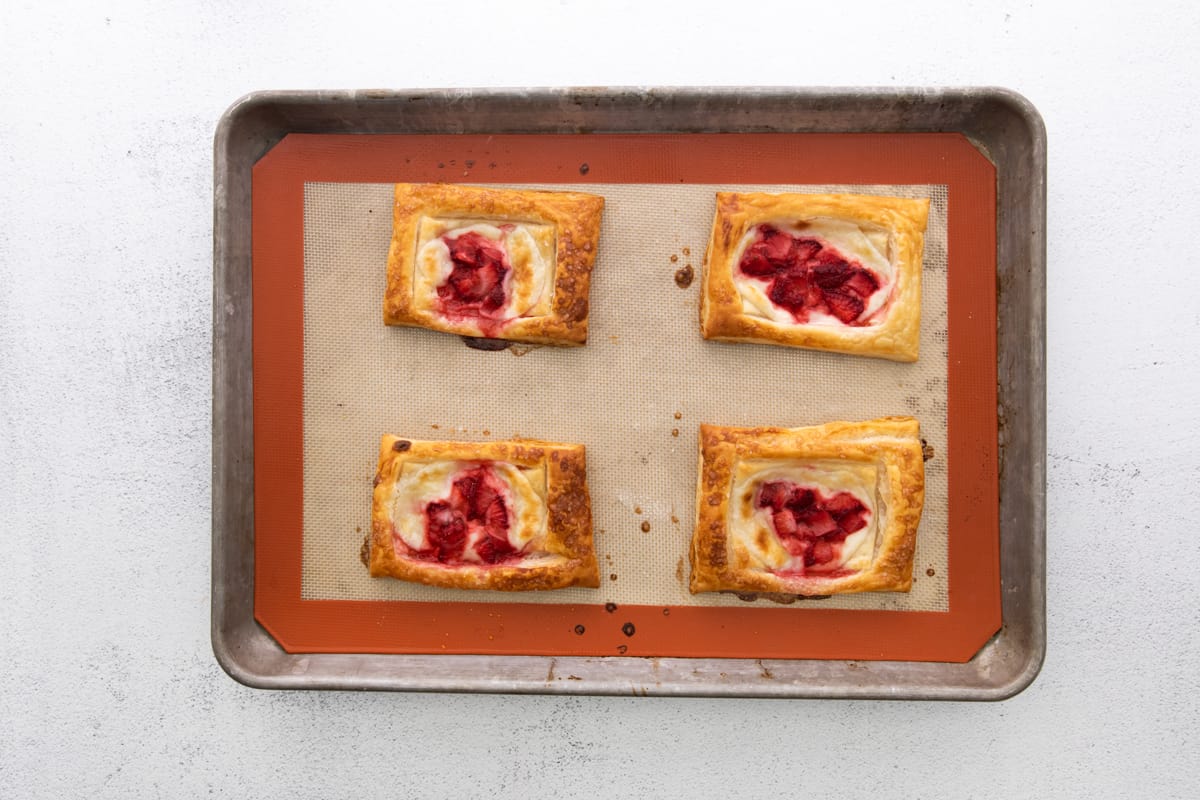 Baked strawberry danishes.