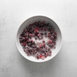 a bowl of sugared cranberries