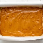 caramel spread over crust in a baking pan.
