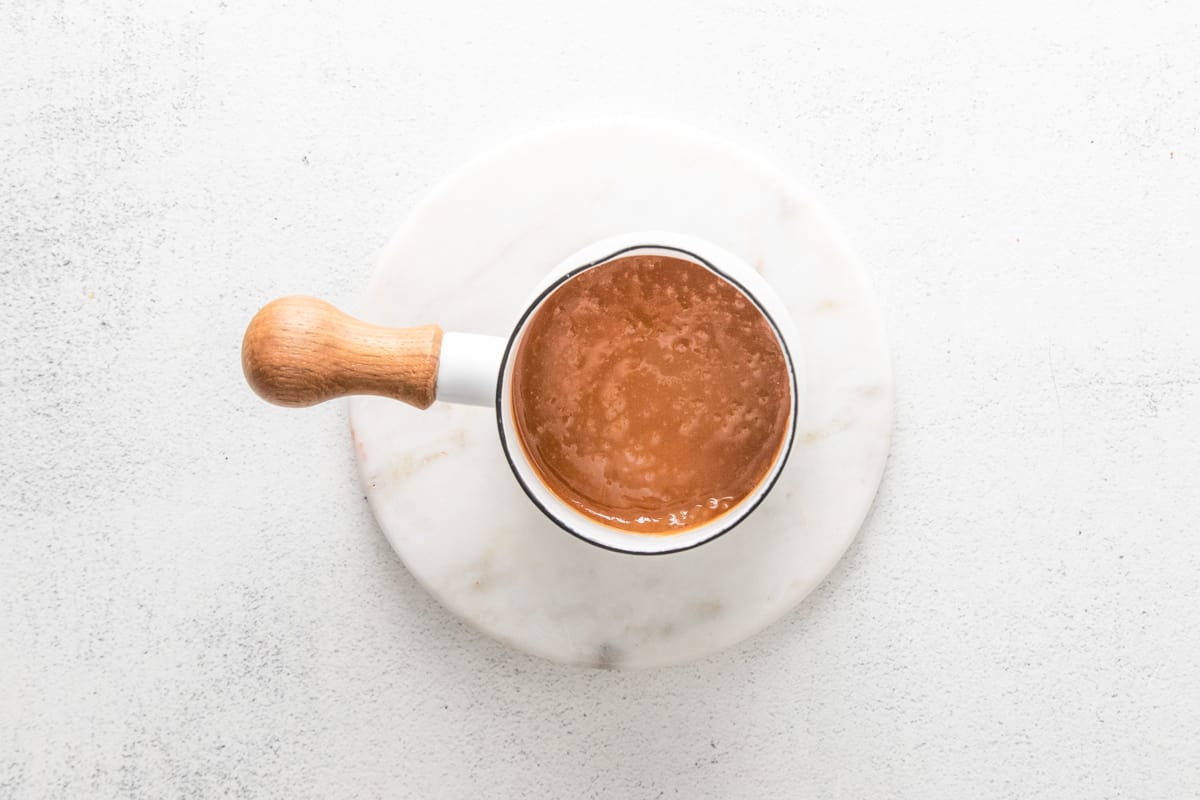 melted caramel in a saucepan.