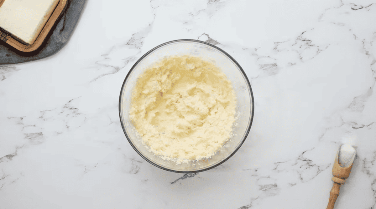 creamed butter and sugar in a glass bowl.