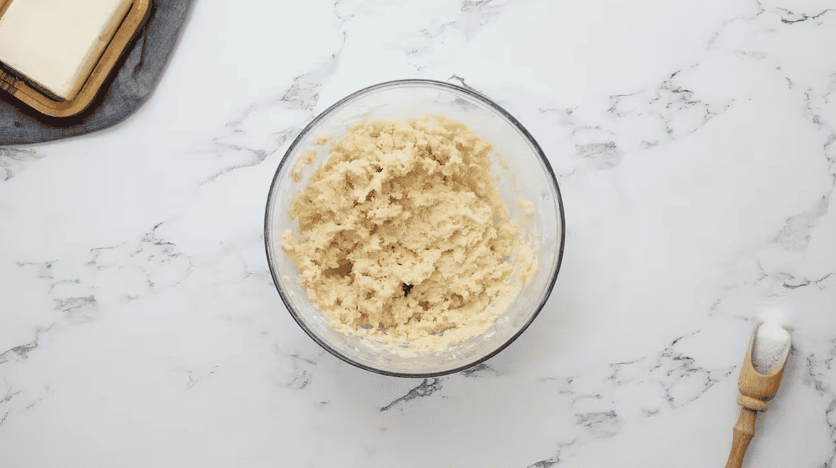 butter cookie dough in a glass bowl.