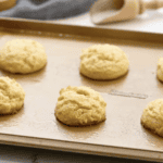 baked butter cookies on a baking sheet.