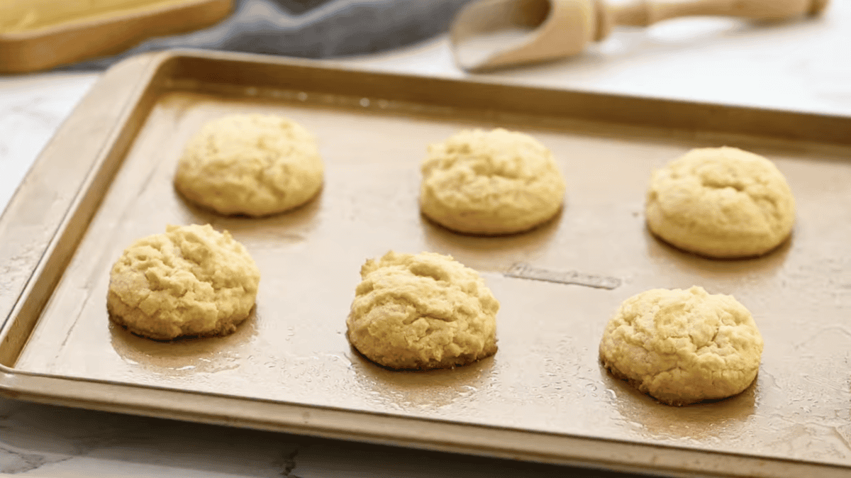 baked butter cookies on a baking sheet.