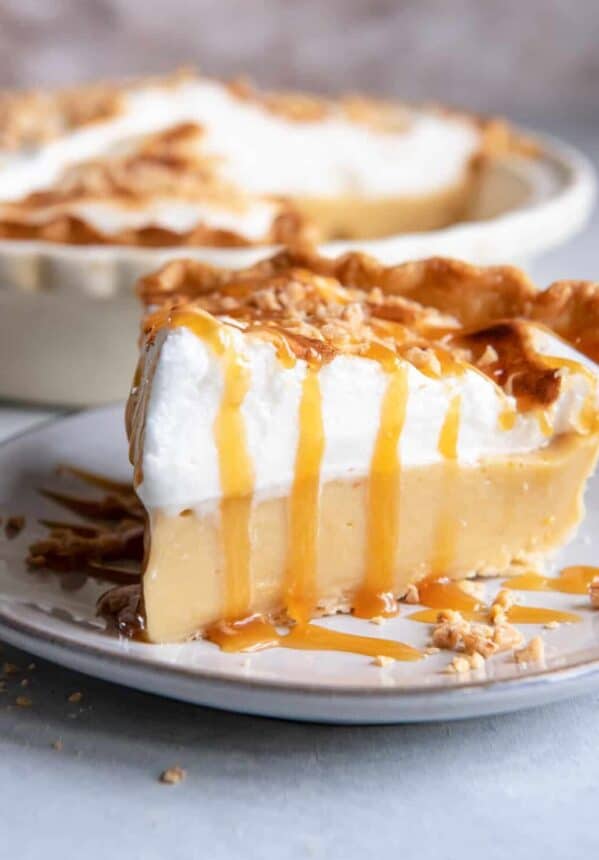 a slice of homemade butterscotch pie on a plate