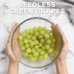 green grapes in a glass bowl.