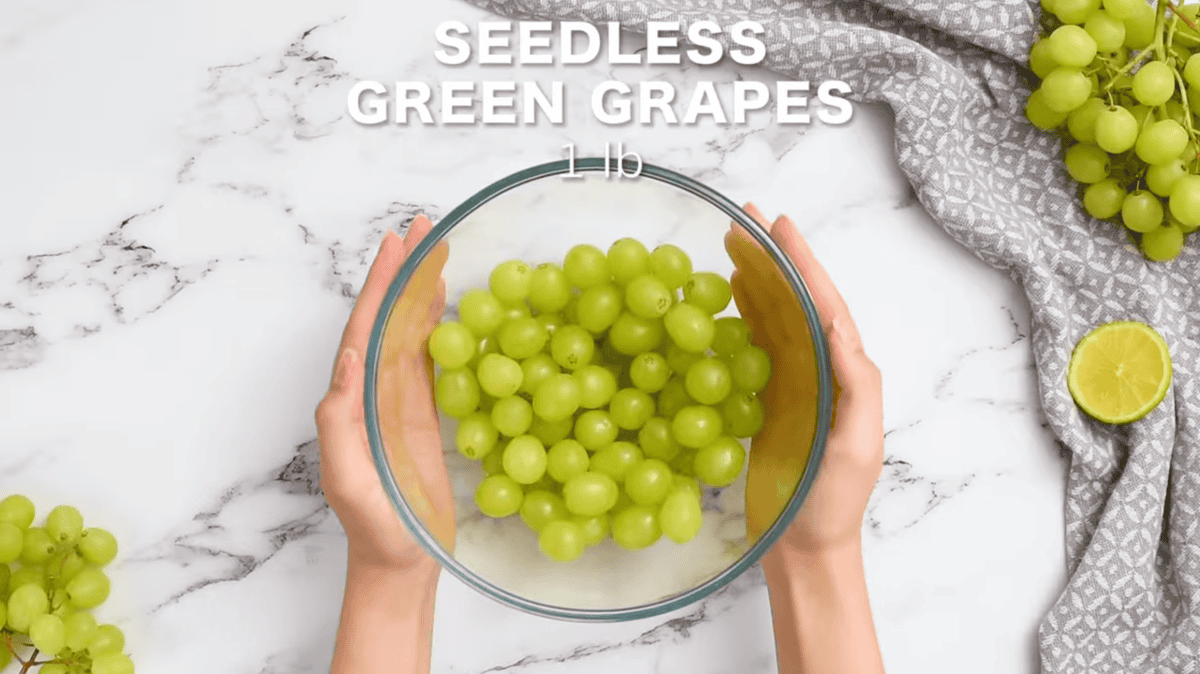 green grapes in a glass bowl.