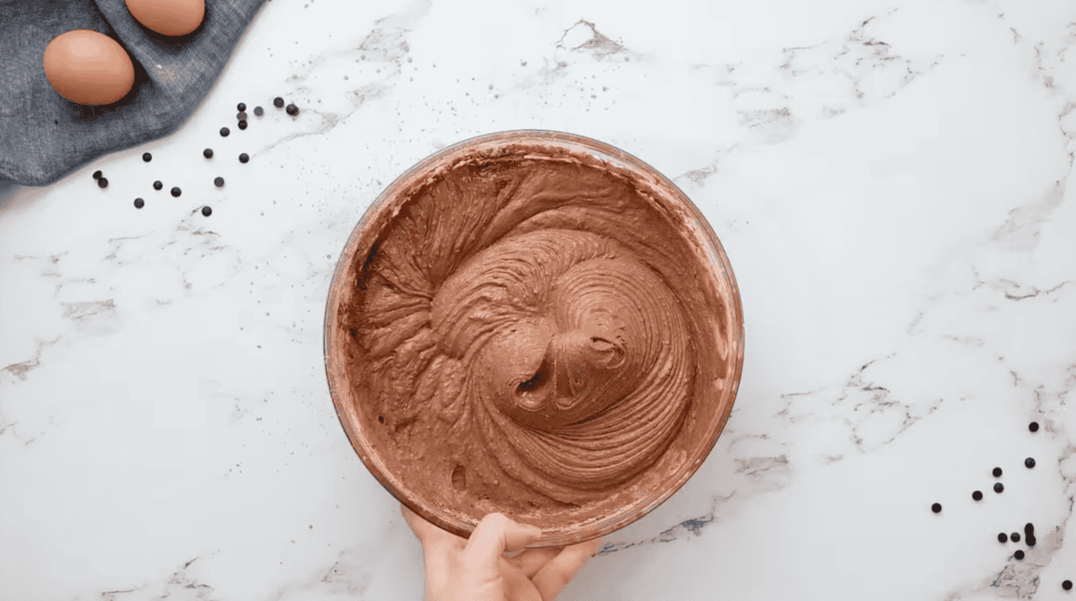 chocolate pound cake batter in a glass bowl.