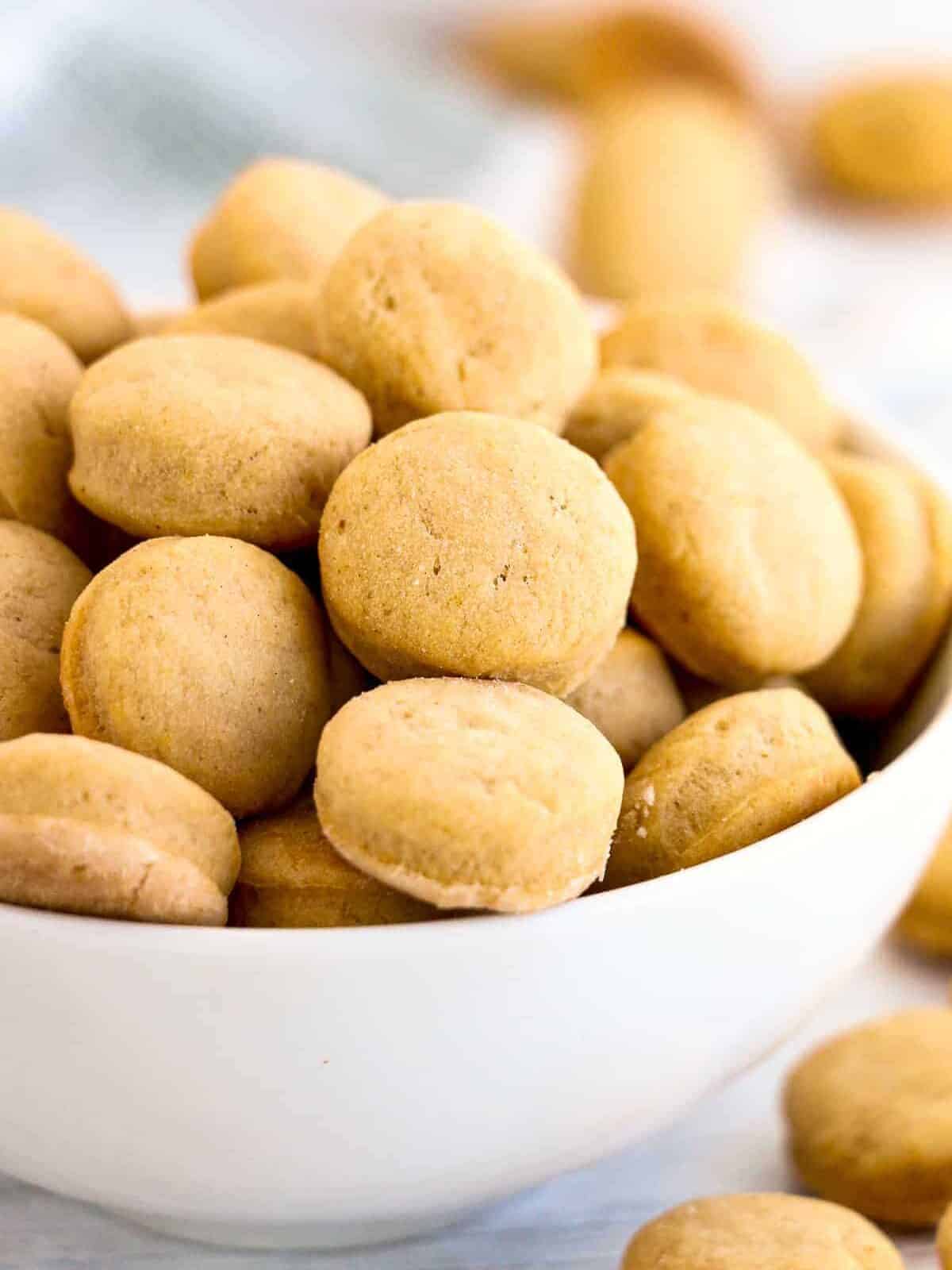 white bowl of homemade peanut butter dog treat cookies
