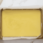 unbaked lemon bars in a baking pan.