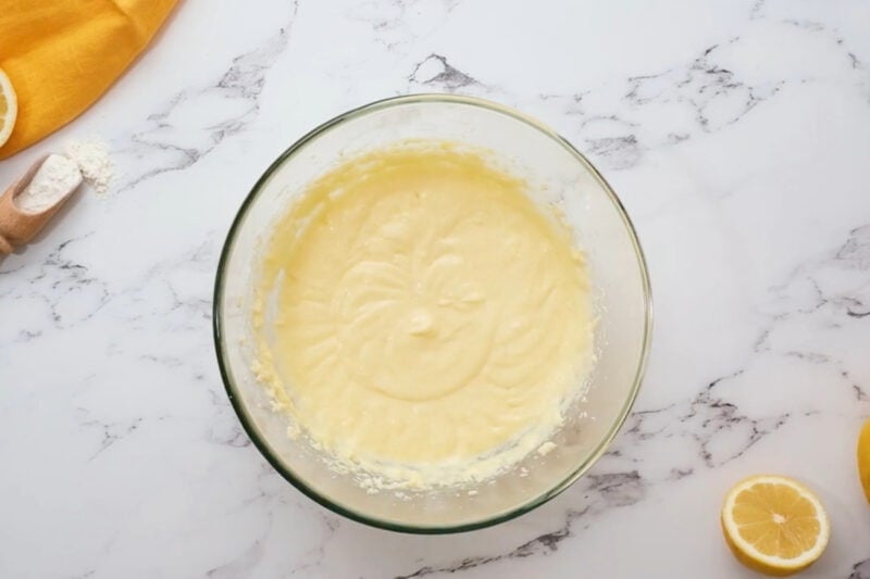 lemon cake batter in a glass bowl.