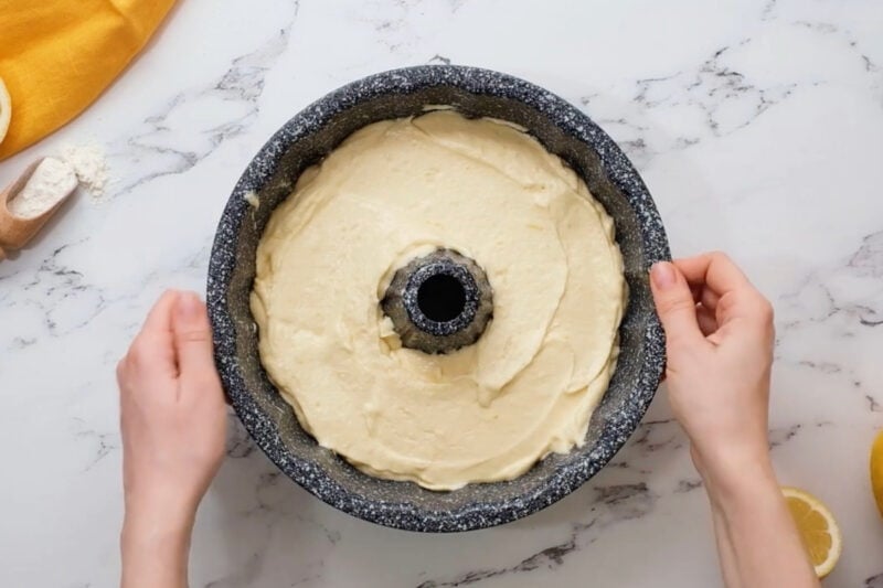 lemon bundt cake batter in a bundt pan.