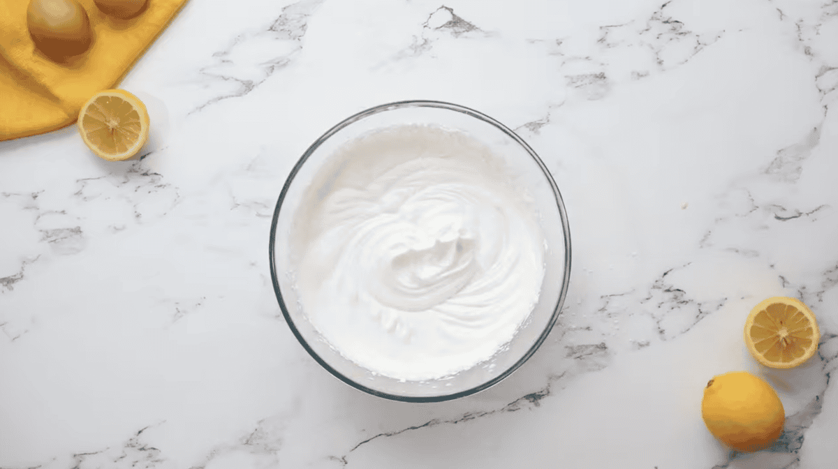 whipped cream in a glass bowl.