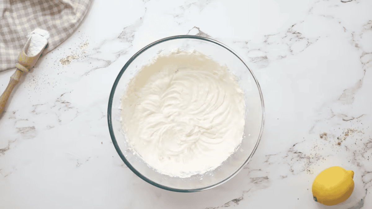 lemony whipped cream cheese in a glass bowl.