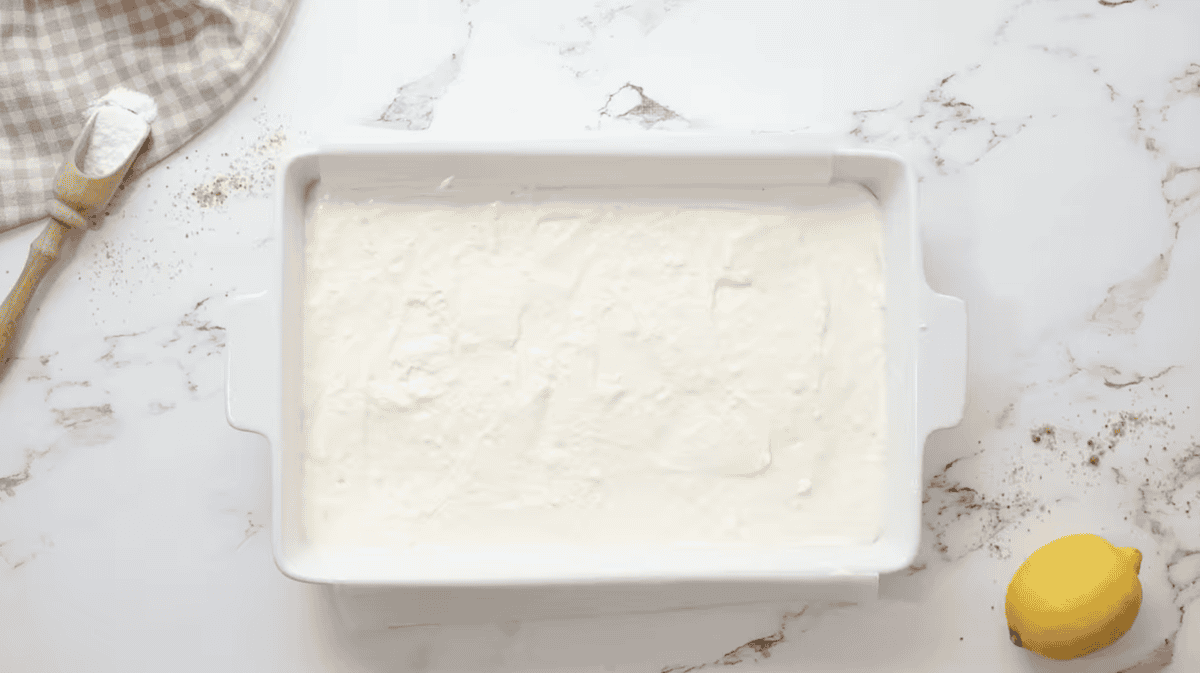 no bake lemon cheesecake in a baking pan.