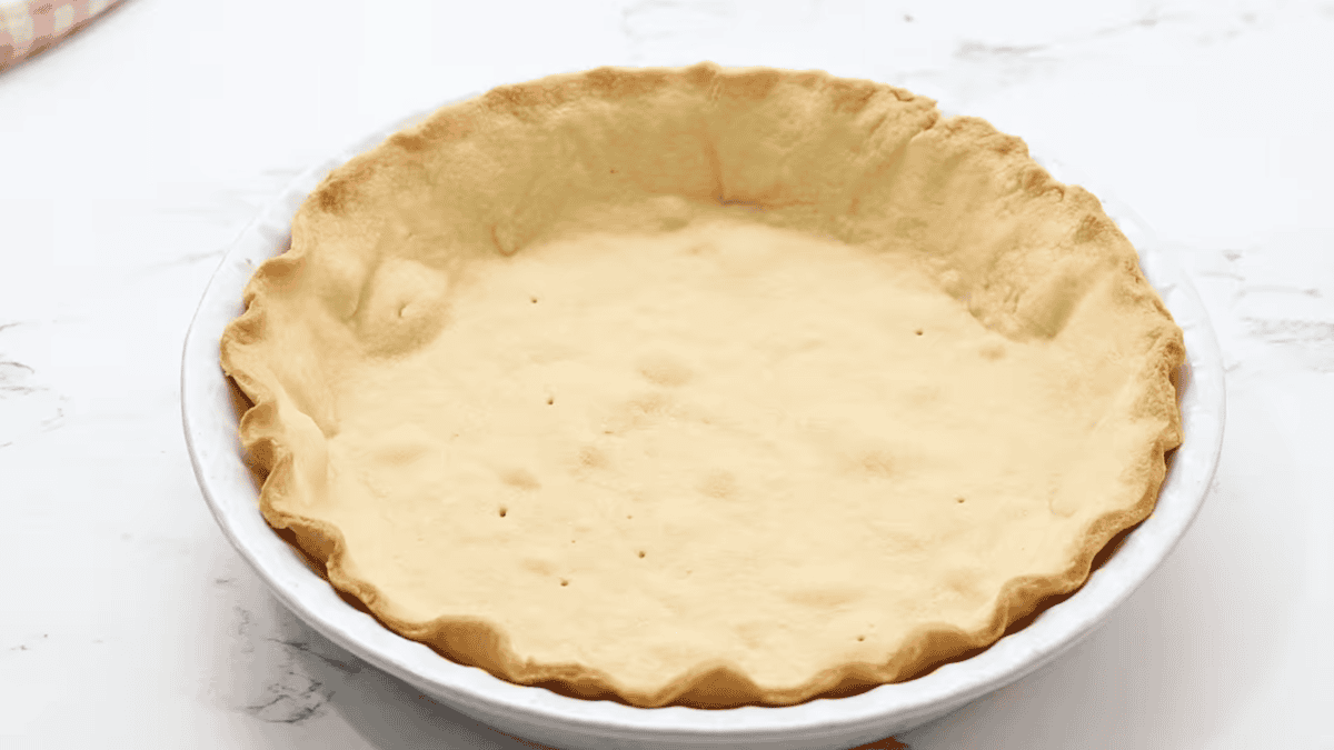 baked pie crust in a pie pan.