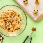 white chocolate cranberry cookie dough in a glass bowl.