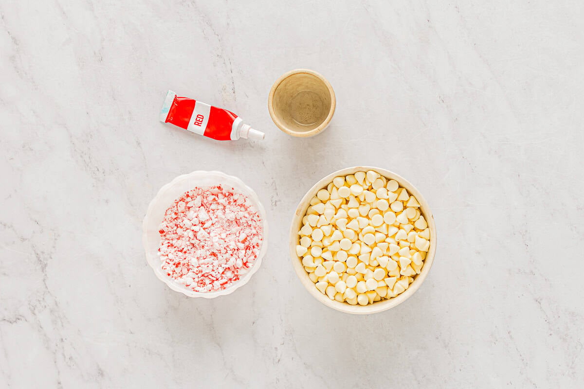 measured ingredients for white chocolate peppermint bark in individual bowls.