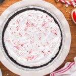 peppermint pie topped with whipped cream and crushed peppermints.