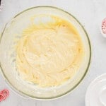 whipped white chocolate cream cheese filling in a glass bowl.