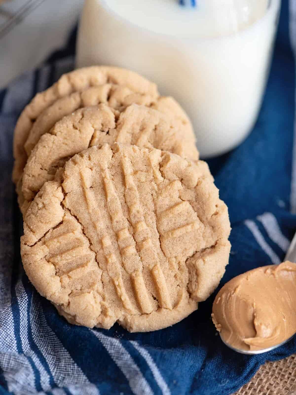 peanut butter cookies next to a glass of milk