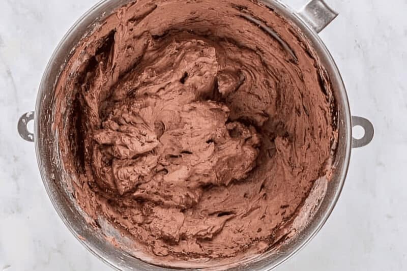 beaten chocolate whipped cream in a mixing bowl.