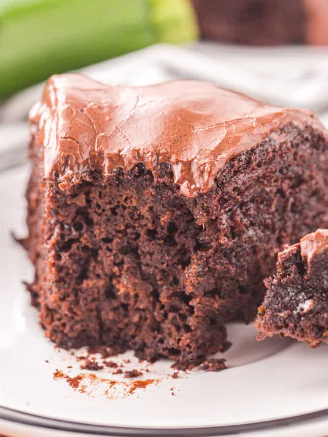 close up of a partially eaten slice of moist chocolate bundt cake