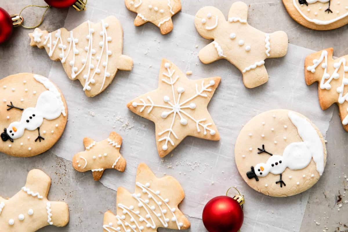 iced peppermint shortbread christmas cookies on parchment.