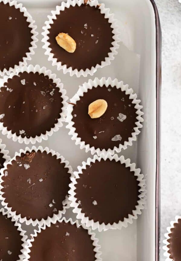 Chocolate peanut butter cups in a baking pan.