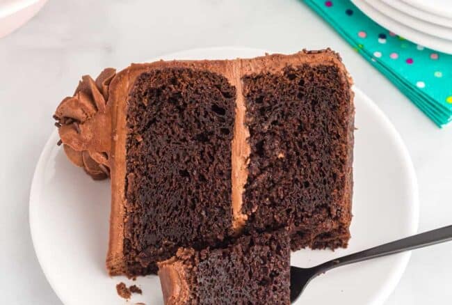 a slice of cake made with doctored chocolate cake mix